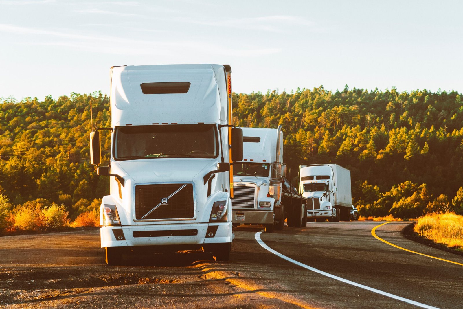 white volvo semi truck on side of road 2199293 scaled